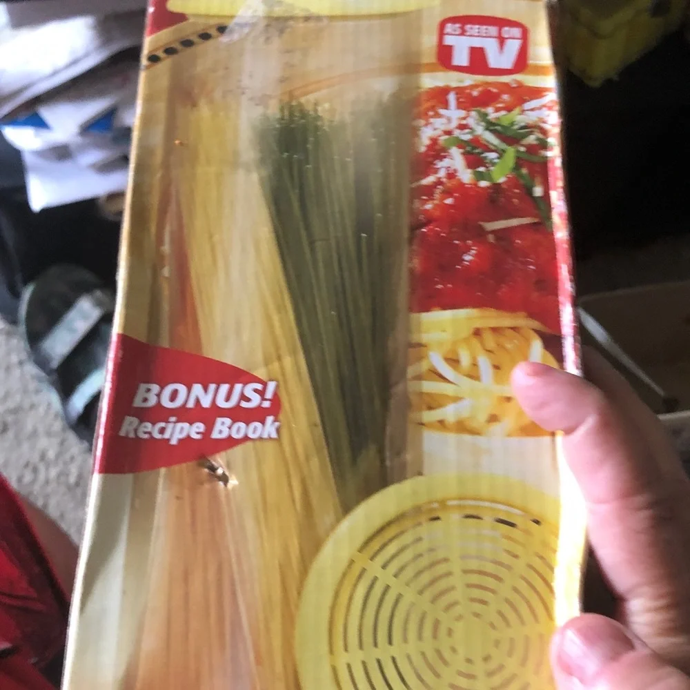 Express Pasta Express Stovetop Pasta Cooker in Yellow and Red Packaging